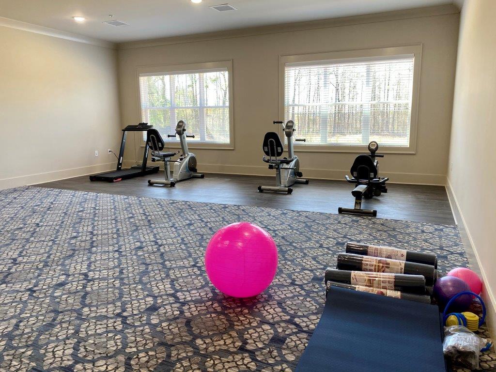 There is a pink ball in the middle of the room.