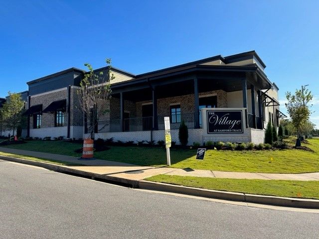 A large building with a sign that says village on it