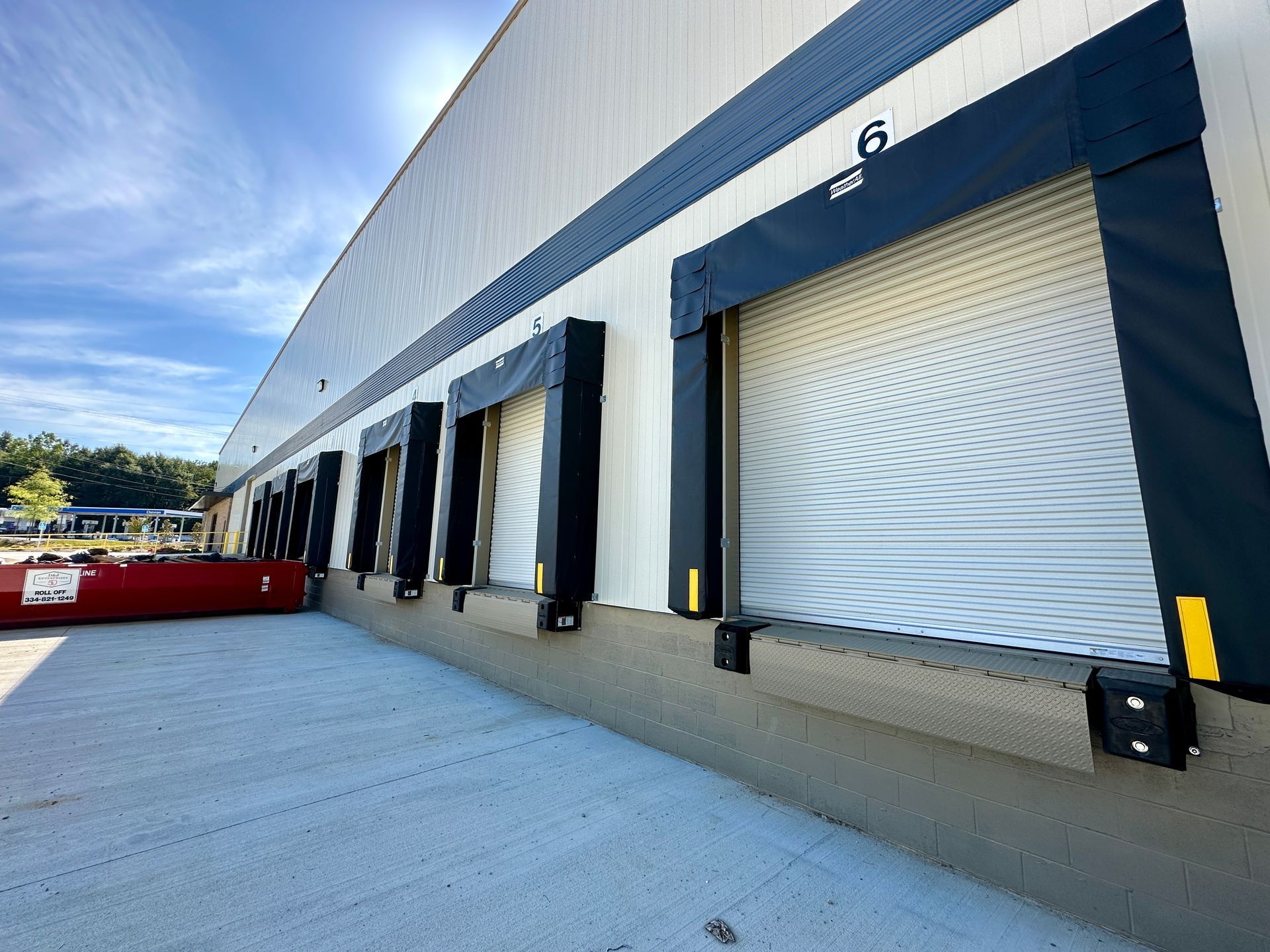 A large building with a lot of loading docks on it