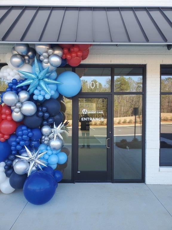 A building with a lot of balloons in front of it