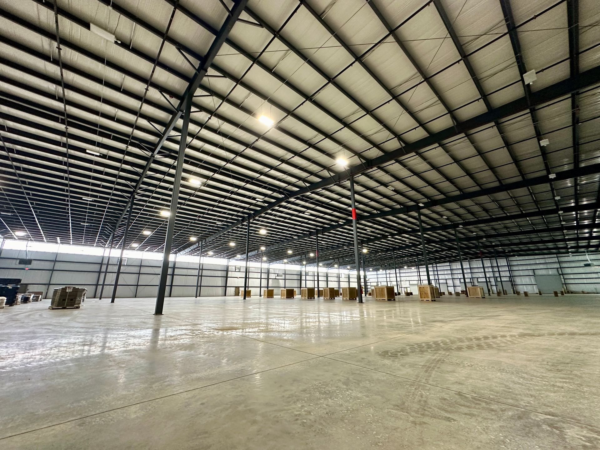 A large empty warehouse with a ceiling that is very high