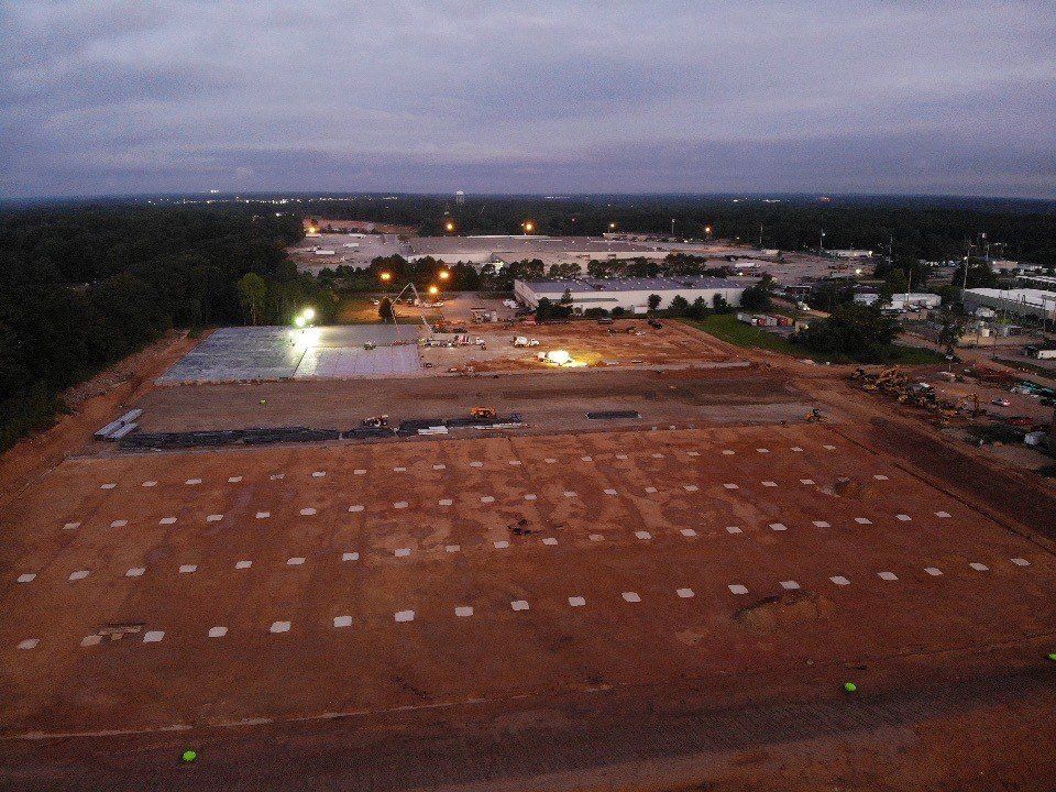 An aerial view of a construction site at night
