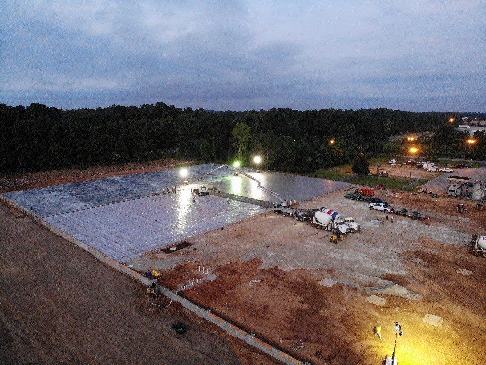 An aerial view of a construction site at night.