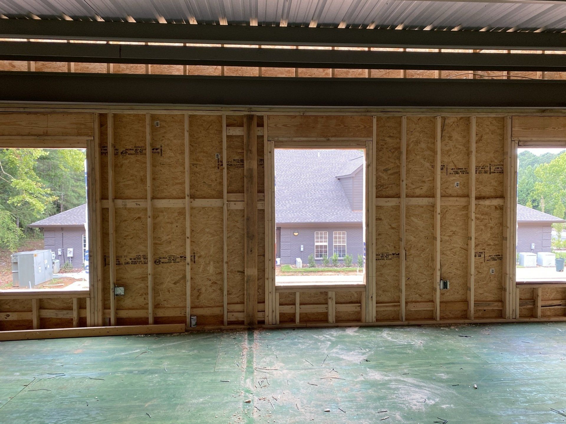 A building under construction with a lot of windows