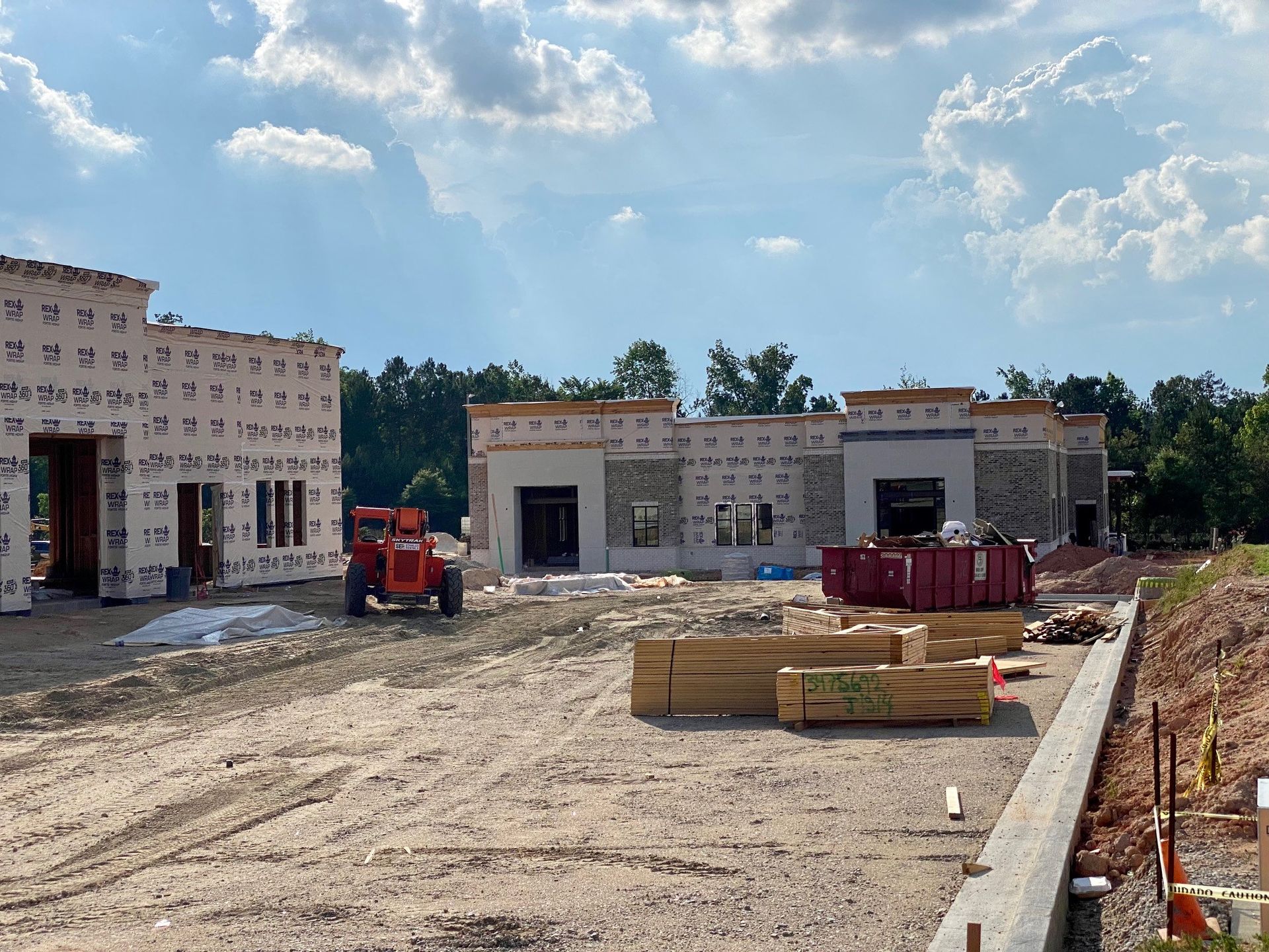 A construction site with a lot of buildings being built.