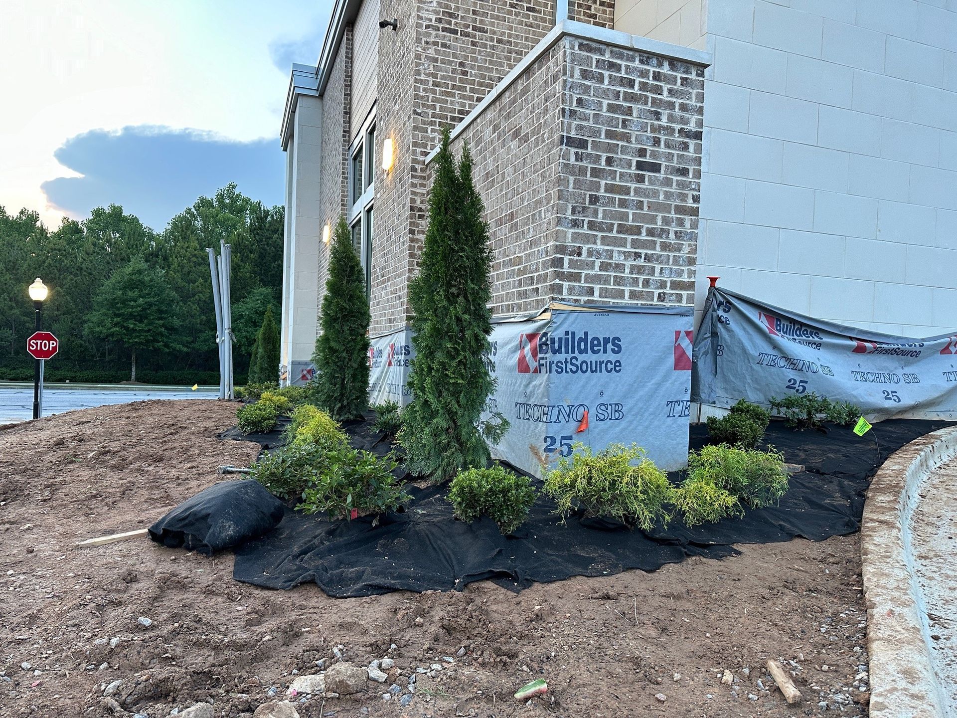 A building under construction with a sign that says `` builders '' on it.