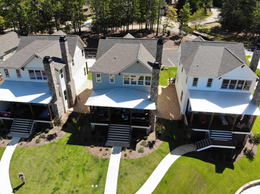 An aerial view of a row of houses in a residential area