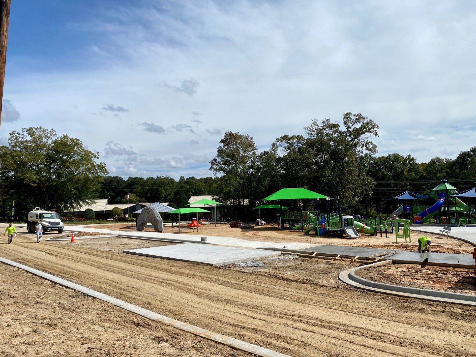 A playground is being built in a park.