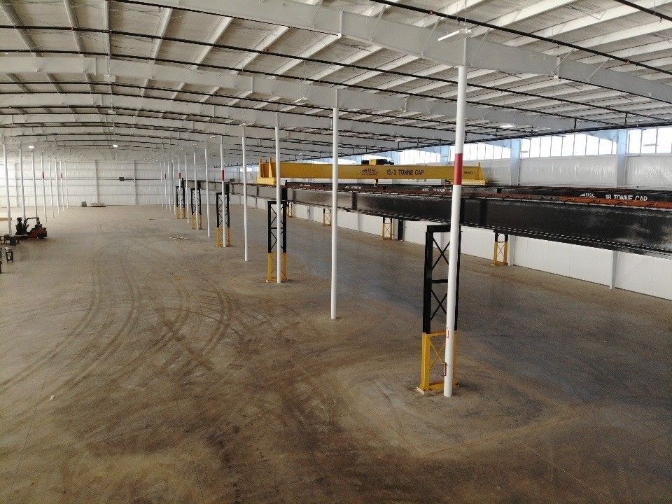 A large warehouse with a lot of empty space