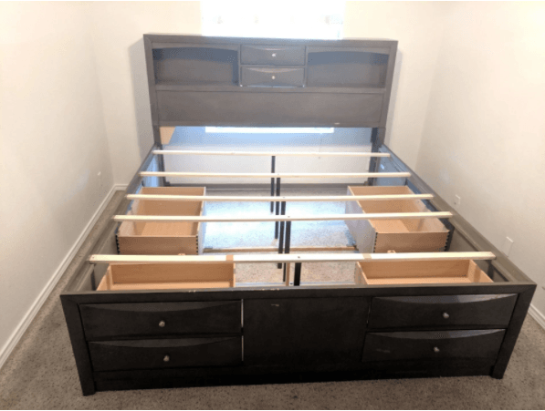 This is a Queen bedframe with storage in the headboard, and storage drawers underneath