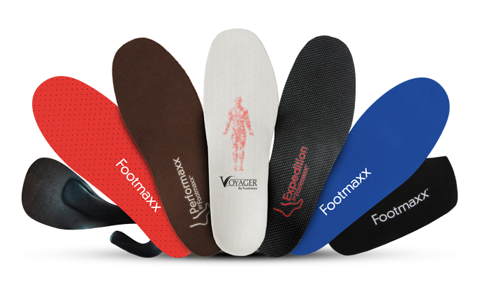 A bunch of different colored insoles with the word footmaxx on them