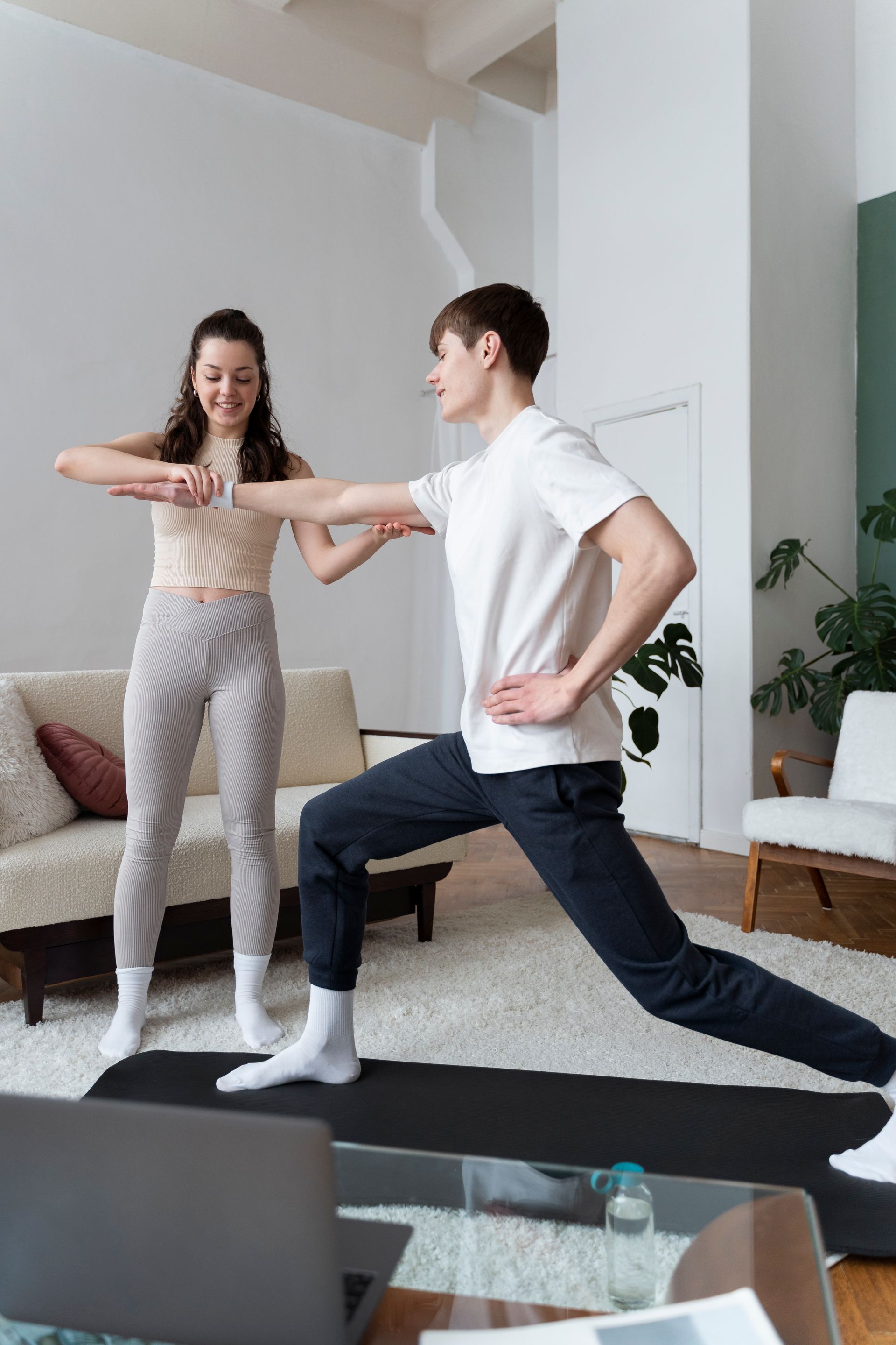 a physiotherapist is checking a patient