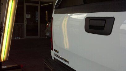 White Car After — Dent Repair in Garden City, KS