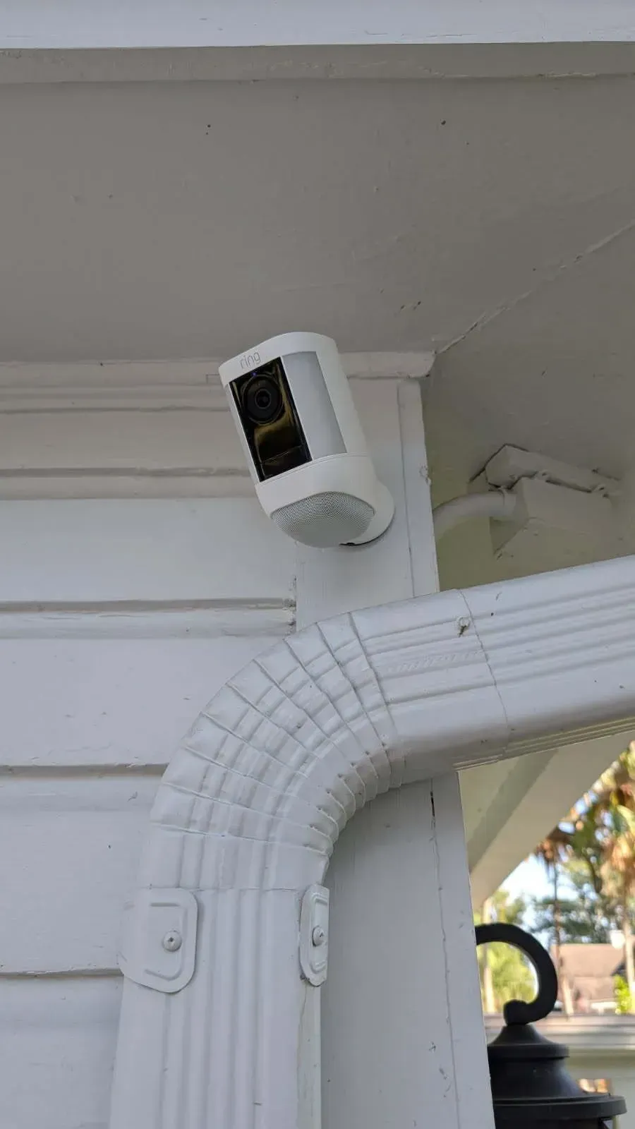 A flat screen tv is mounted on a wall above a entertainment center