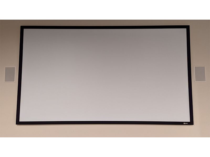 A large projector screen is mounted on a wall.