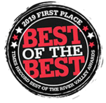 a black and red circle with the words `` best of the best '' written inside of it .
