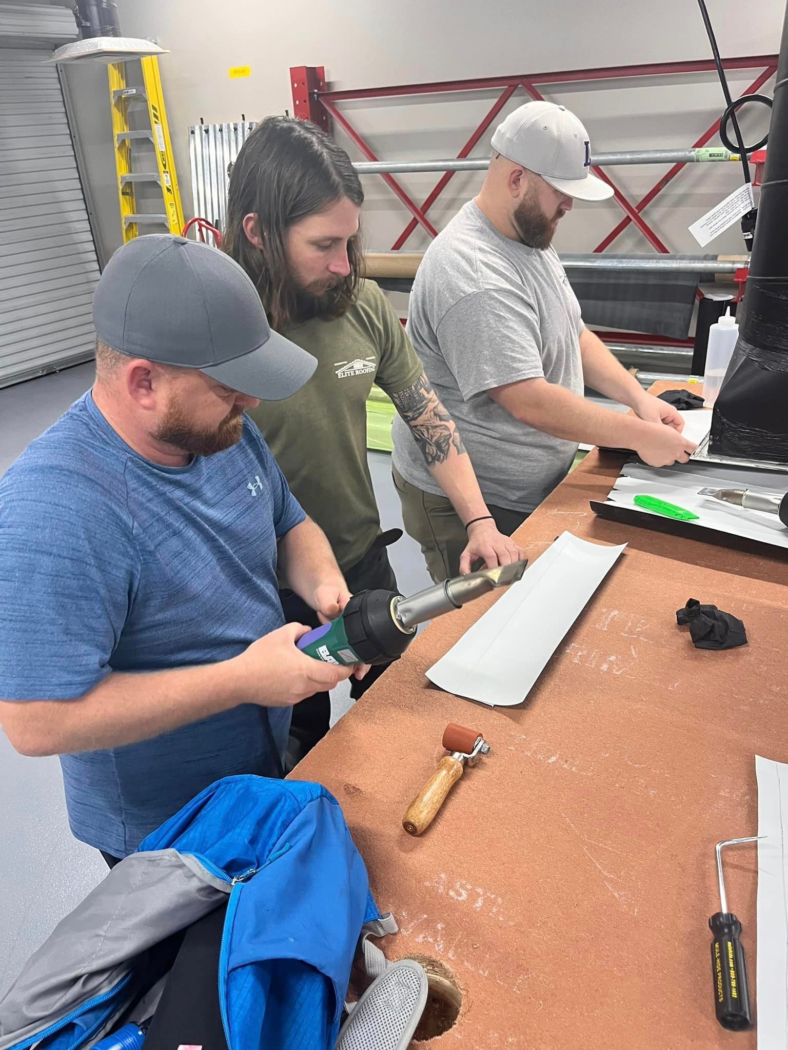 a man wearing a hat with the letter j on it