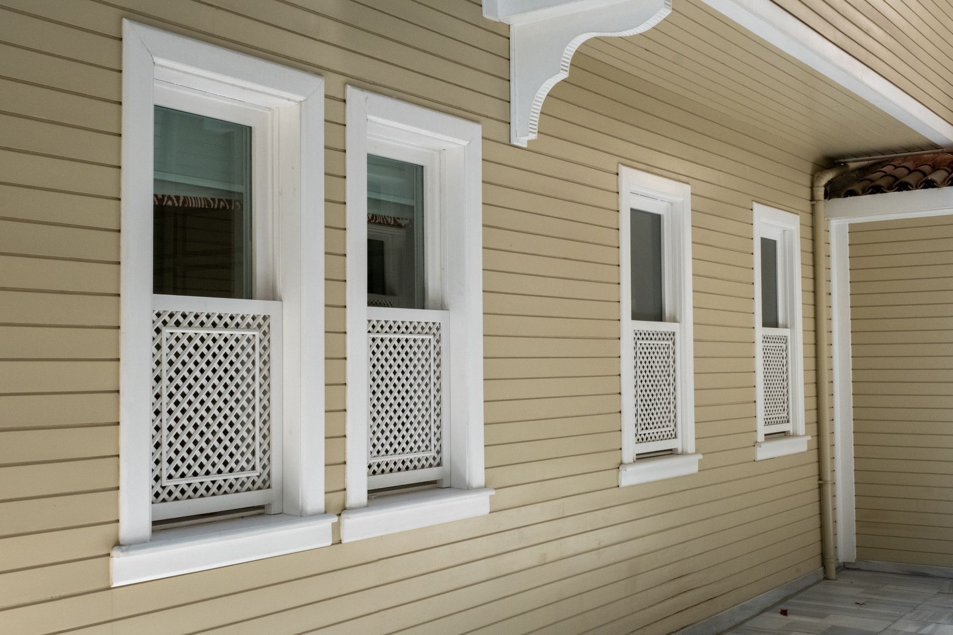 A row of windows on the side of a building