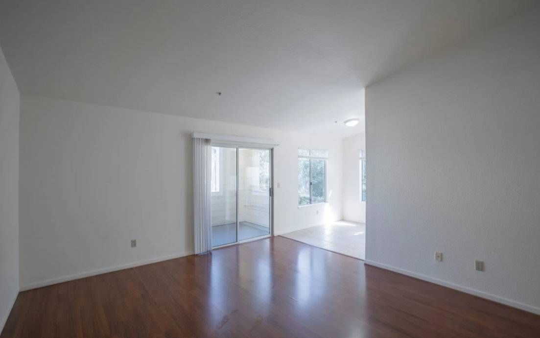 Photo of a large living room showing plenty of natural lighting