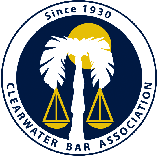 The logo for the clearwater bar association shows a palm tree and scales of justice.