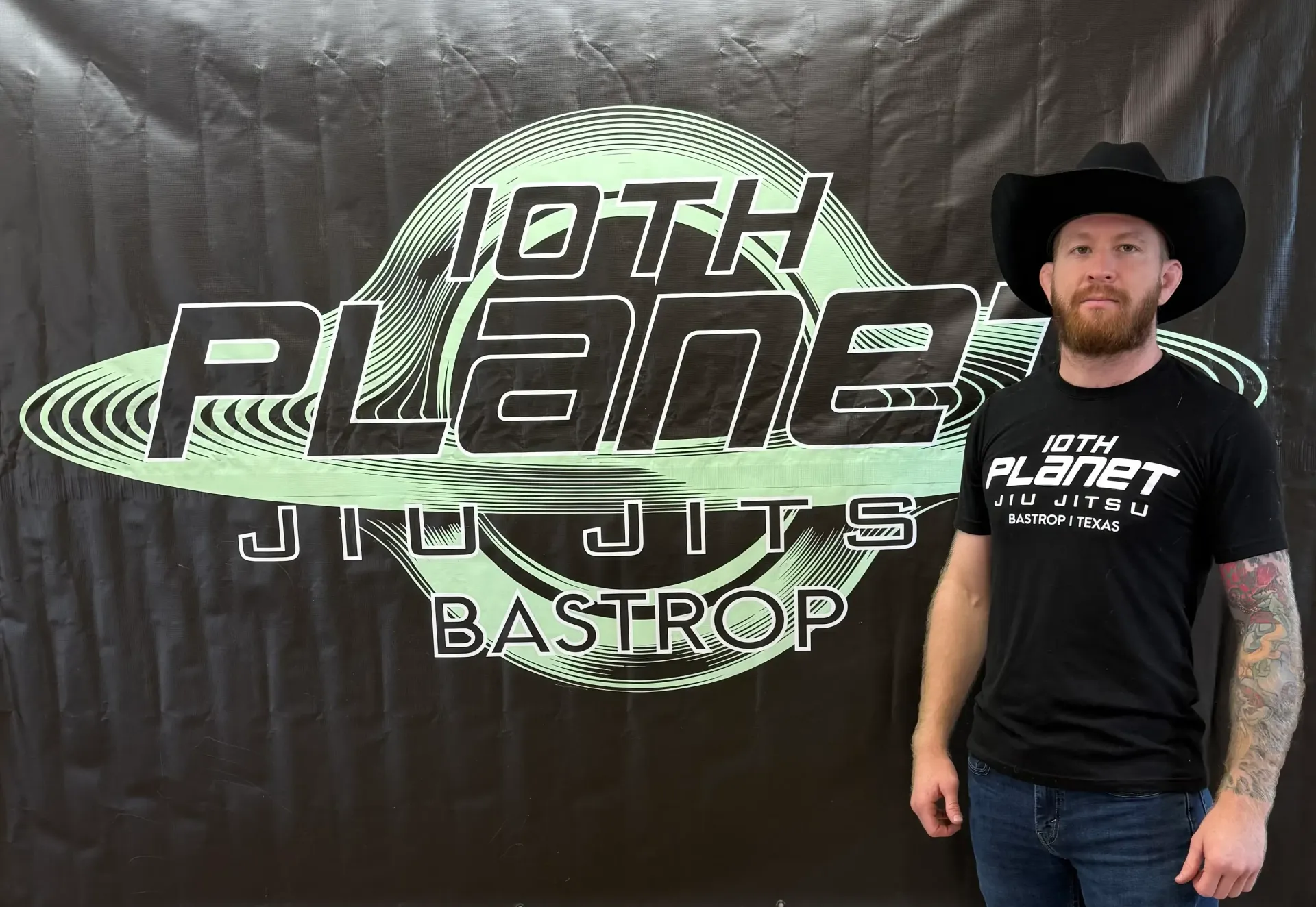 Gabe Tuttle standing at 10th Planet Bastrop Brazilian Jiu-Jitsu academy in Bastrop, Texas
