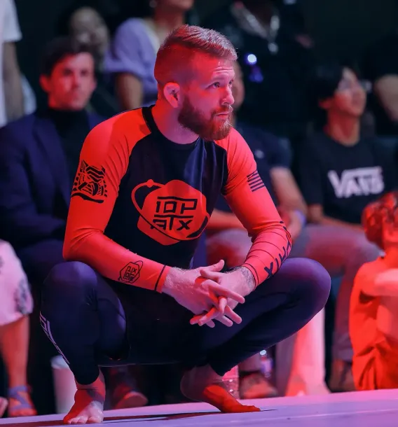 Gabe Tuttle, Brazilian Jiu-Jitsu instructor, coaching during a no-gi grappling event
