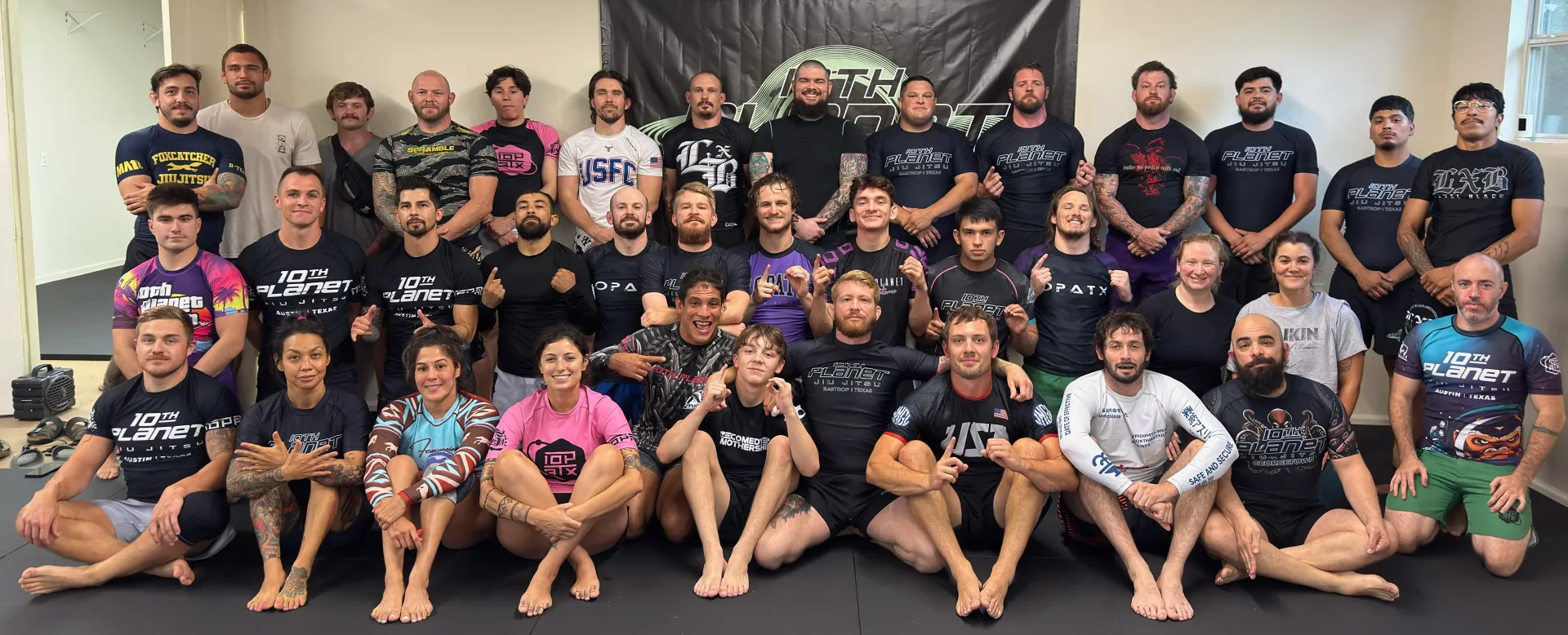 Students and coaches training at 10th Planet Bastrop no-gi Brazilian Jiu-Jitsu academy in Bastrop, Texas