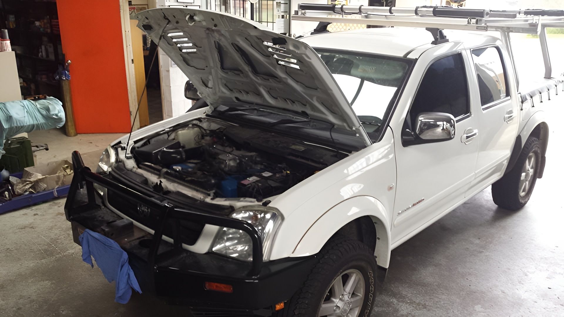 White Pickup Truck With Hood Open — EFI Evolutions Mechanical Repairs in Coffs Harbour, NSW