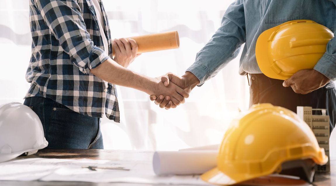 Contractor and Client Shaking Hands