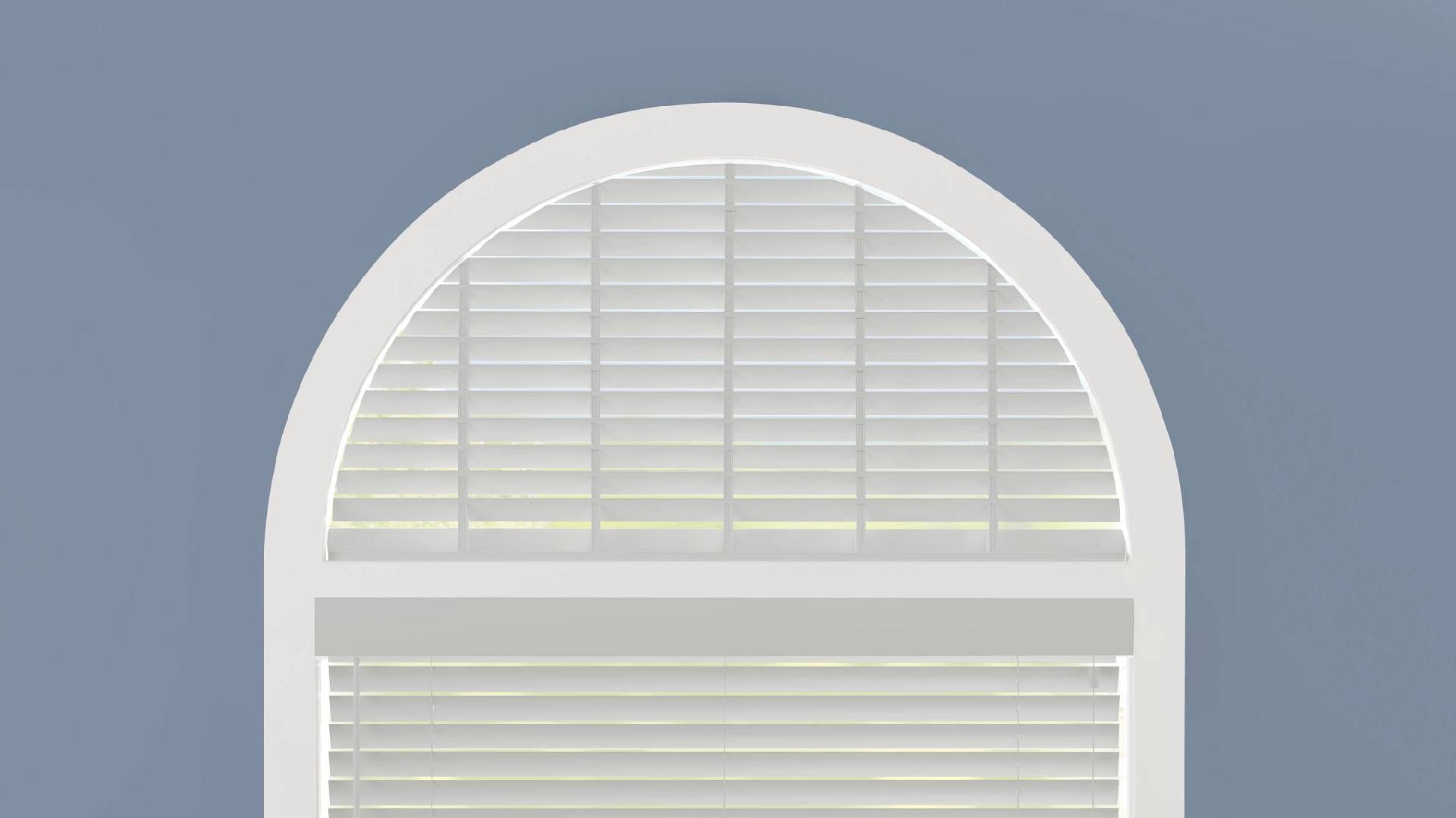 White Hunter Douglas Parkland® Wood Blinds hanging in an arched window