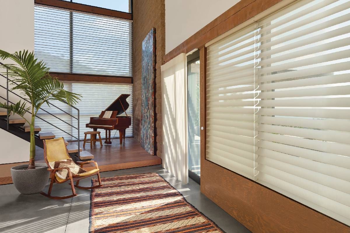 Gorgeous blinds in a living room with a baby grand piano