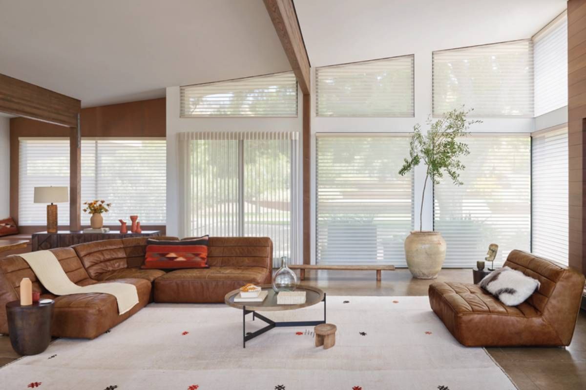 Hunter Douglas Silhouette® Sheer Shades decorating angled windows in a home living room at Curtain Concepts near Huntington, WV