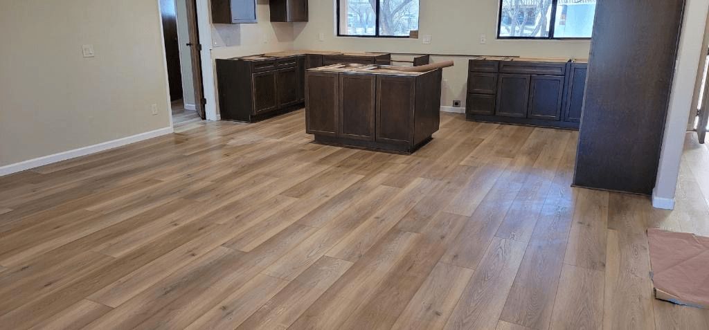 Glass Of Water Spilled In A Wooden Floor - Tucson, Arizona - D & D Flooring