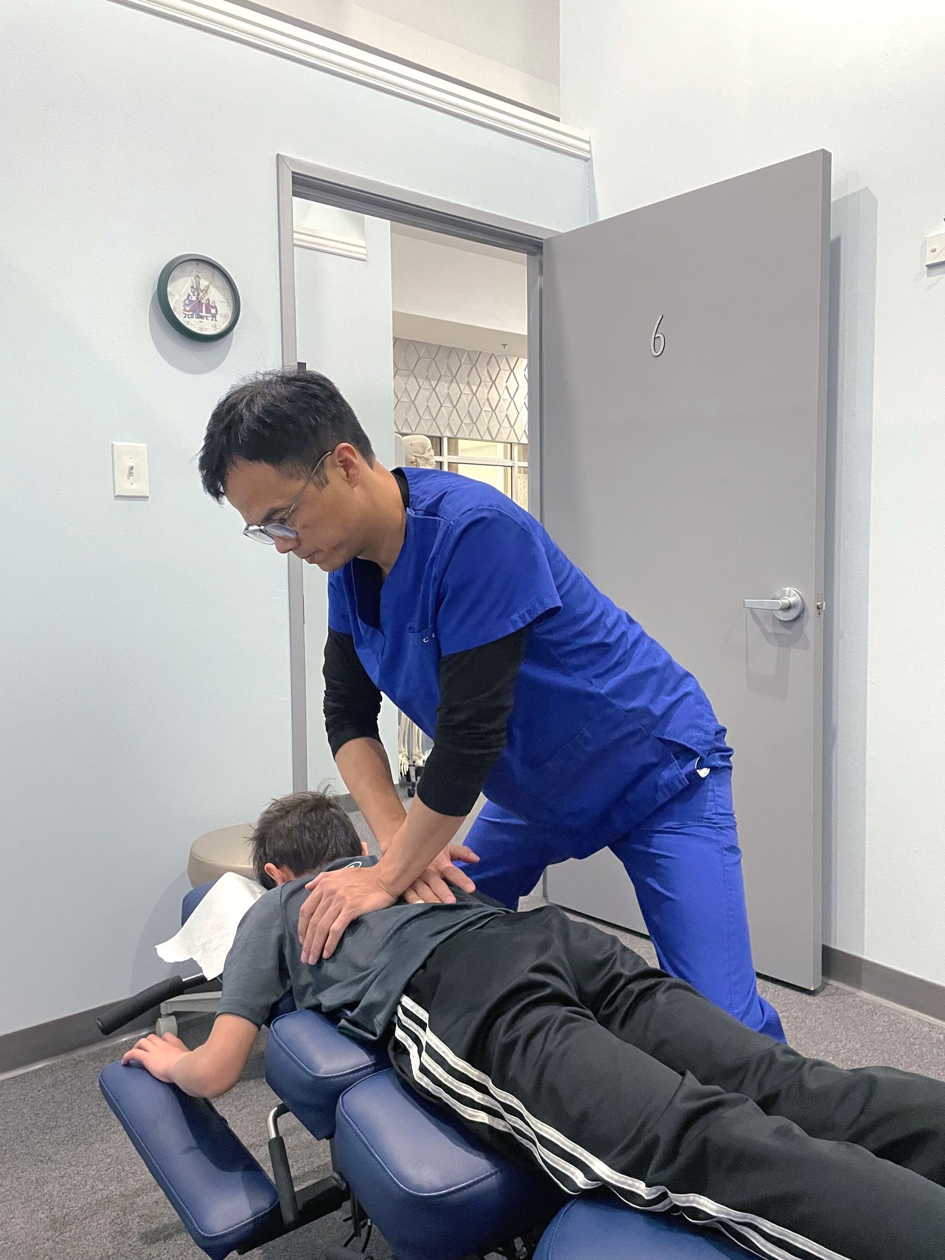 Patient receiving neck chiropractic care for pain relief and improved mobility, performed by a professional chiropractor.