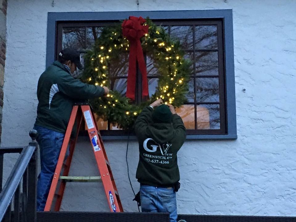 putting up wreaths