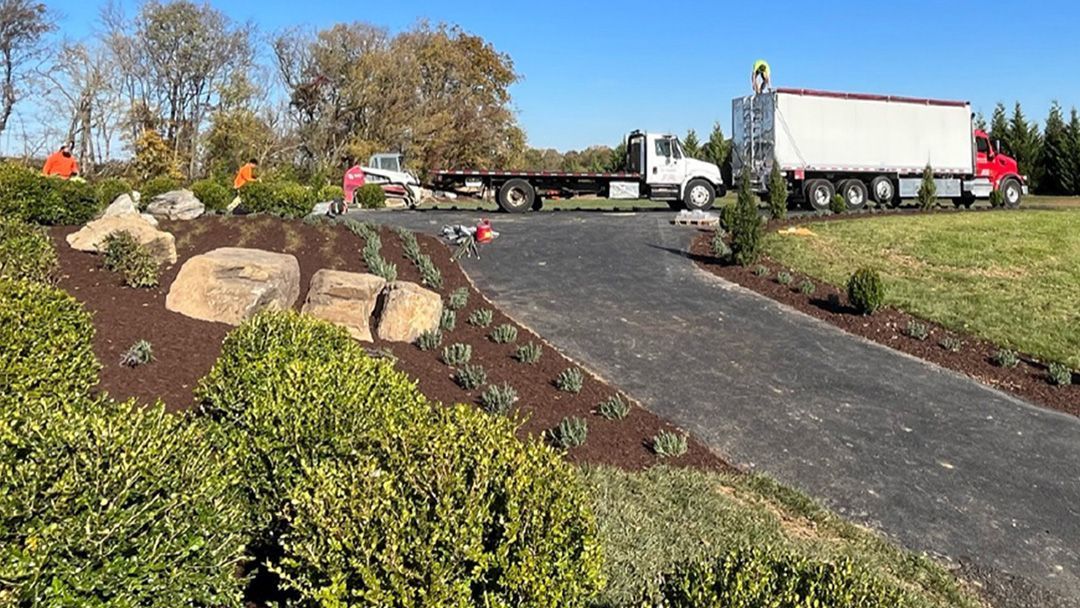 Man Mowing Grass - Brookeville, MD - Gold Leaf Group