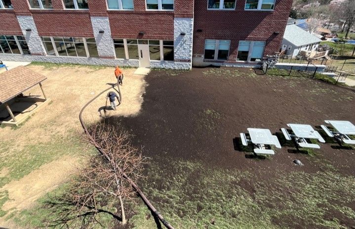 Man Spraying Grass - Brookeville, MD - Gold Leaf Group