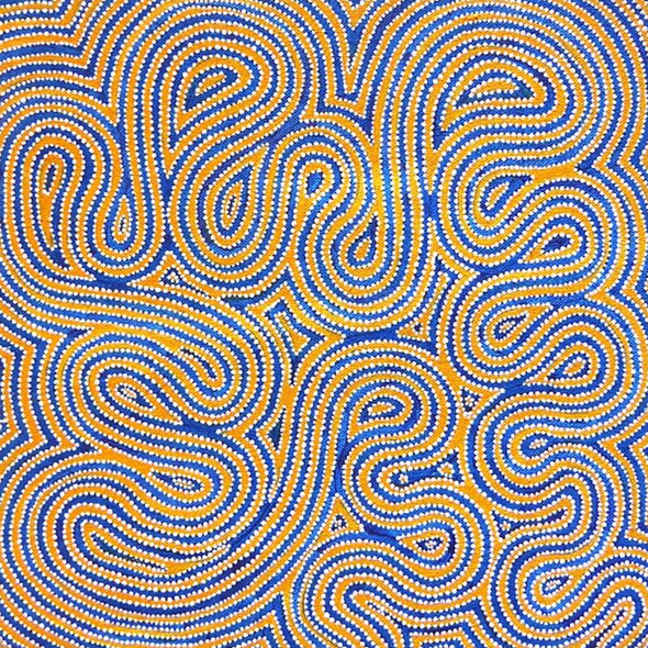 A close up of a painting of a maze on a blue and yellow background.