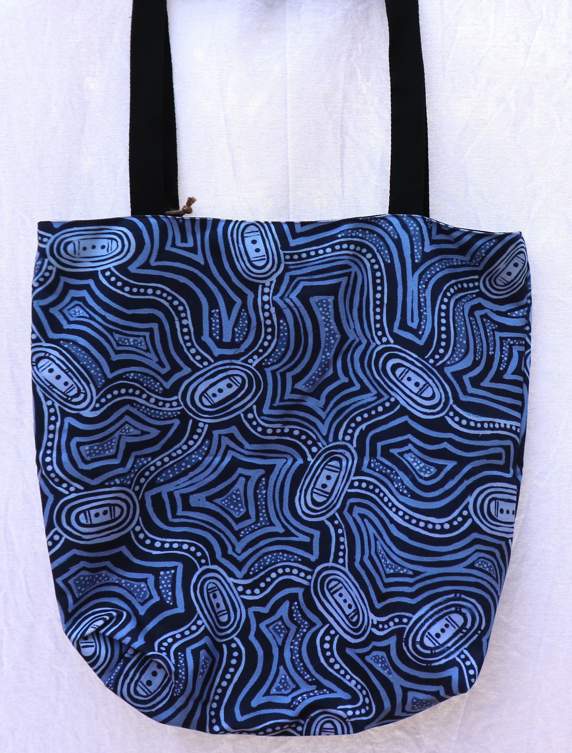 A blue and black tote bag with a black handle