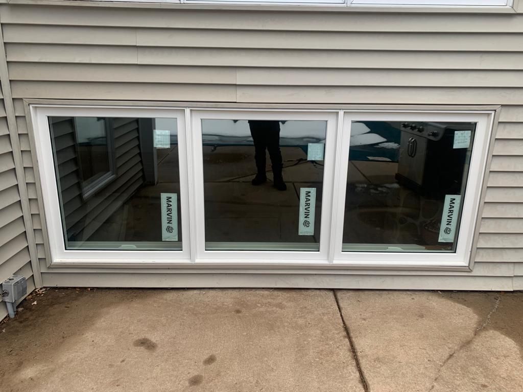 Exterior view of newly installed energy-efficient Marvin windows in Middleton WI.