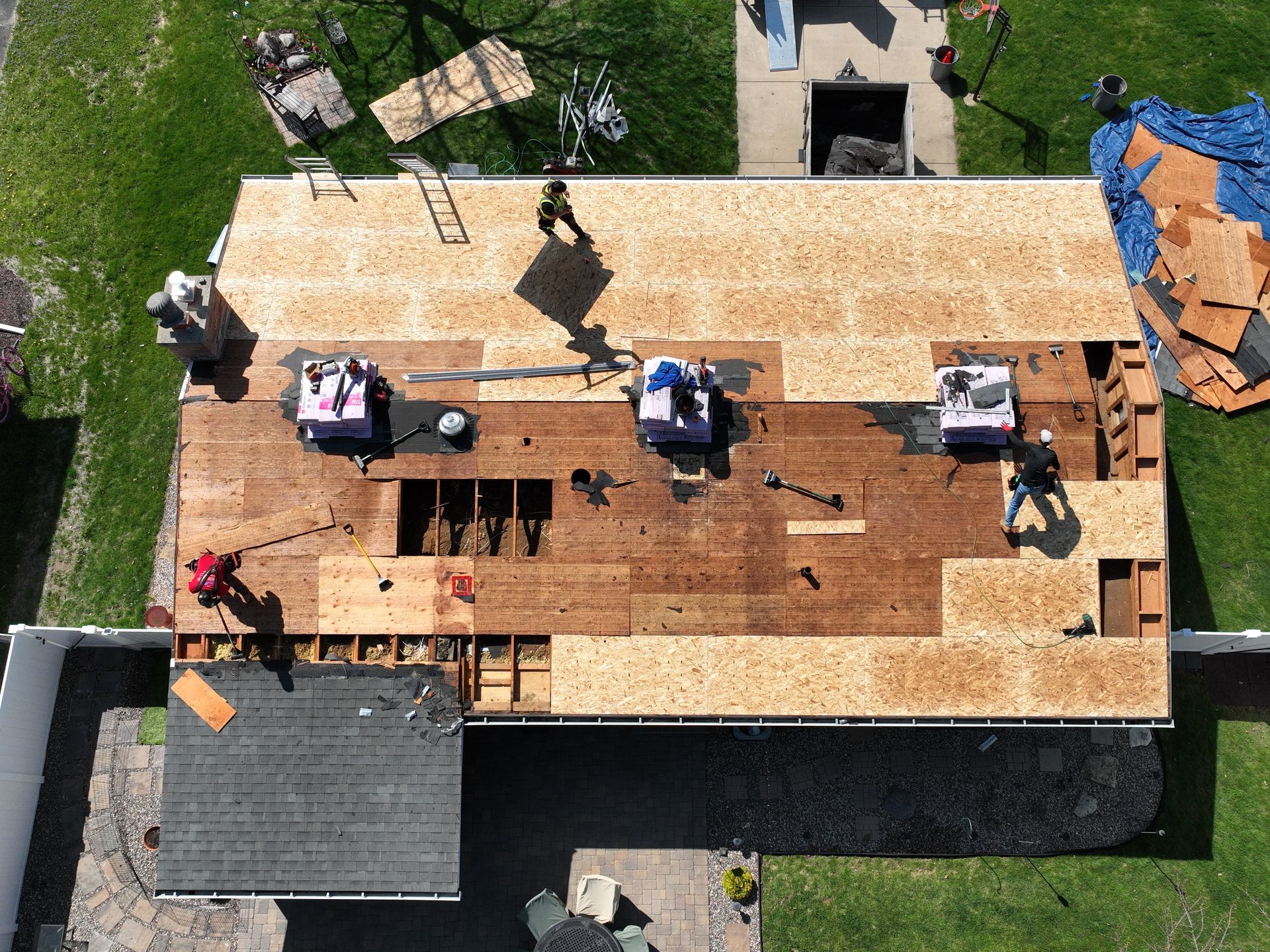 Complete residential roof replacement featuring new architectural shingles on a Middleton home.