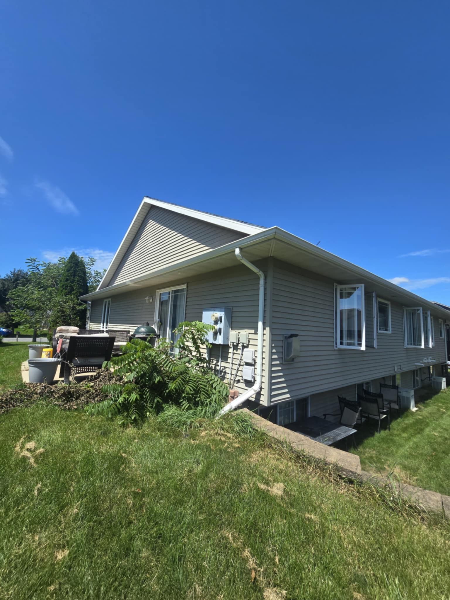 A residential home in Middleton WI featuring newly installed light gray horizontal siding.