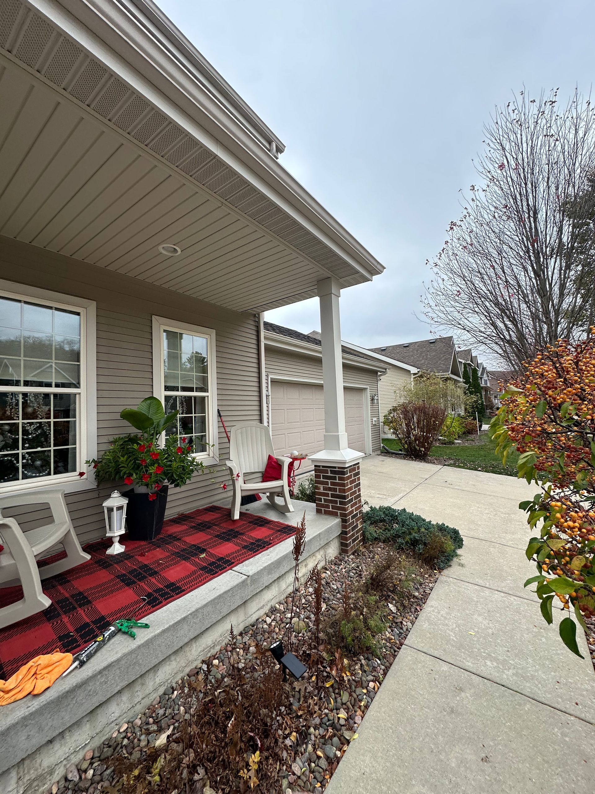 Upward view of clean soffit and fascia lines installed in Middleton WI.