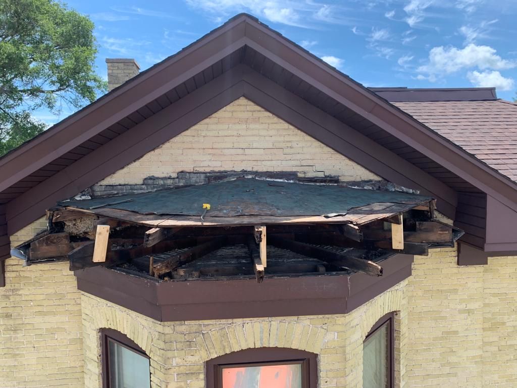 Structural roof repair on a historic bay window in Middleton, Wisconsin.