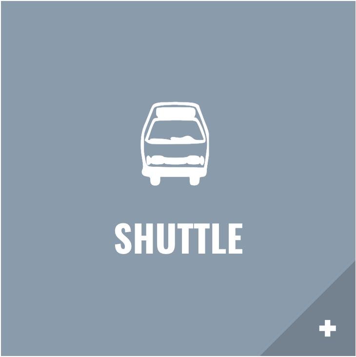 An icon of a bus with the word shuttle below it