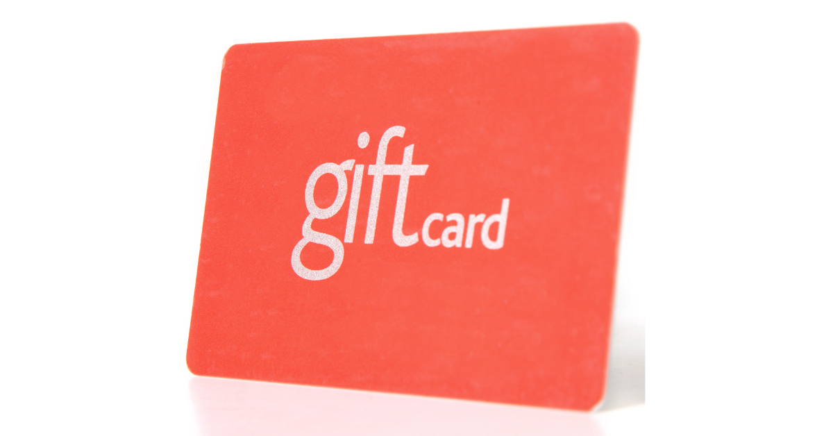 A red gift card with the word gift card written on it