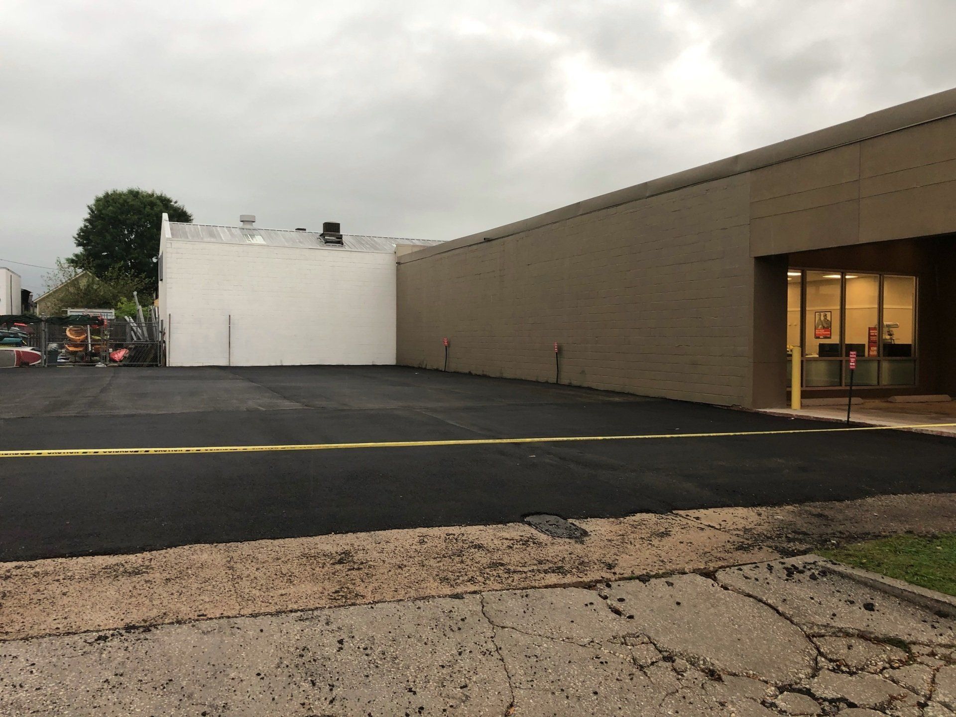 A Parking Garage Beside a Store — Covington, LA — Jenkins Construction and Asphalt
