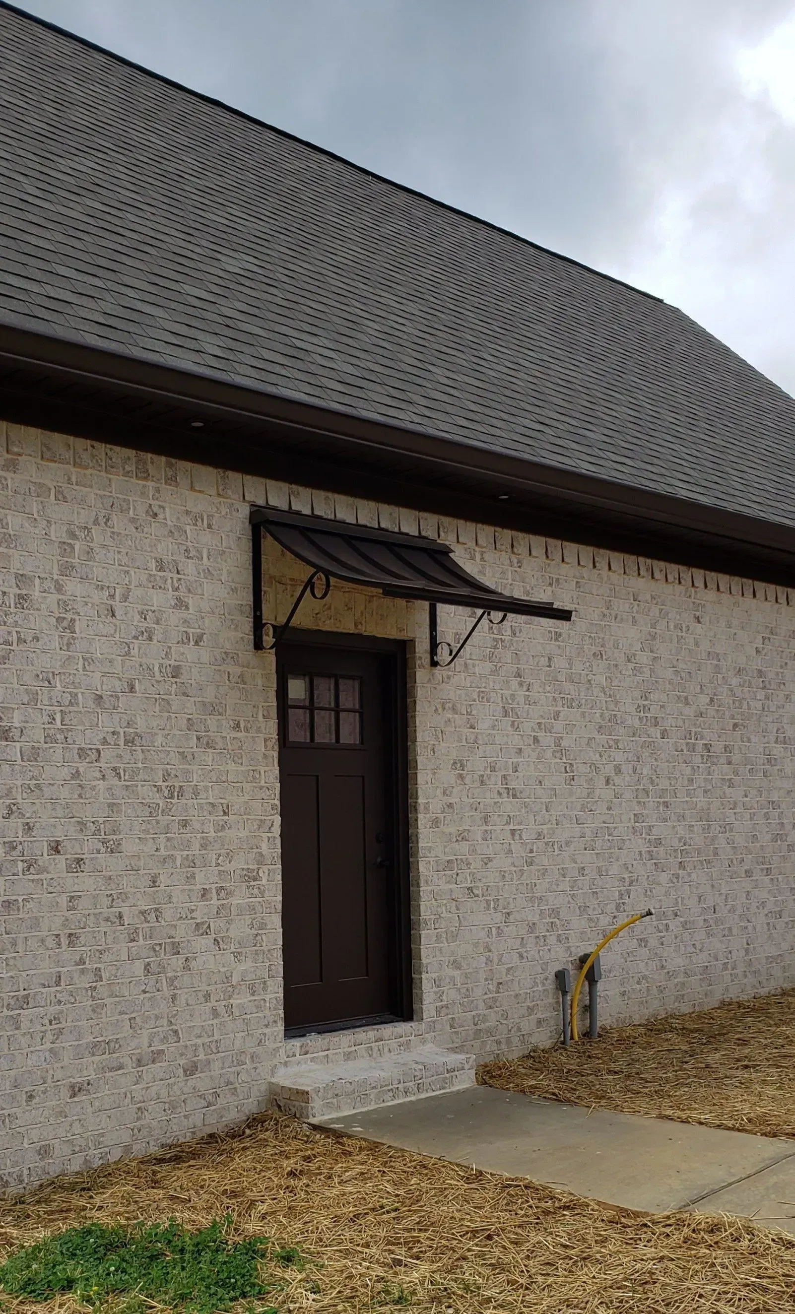 Standing Seam Over the Brown Door — Decatur, AL — Evans Awnings