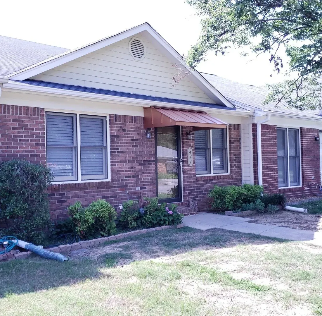 House with Metal Awning Over the Front Door — Decatur, AL — Evans Awnings