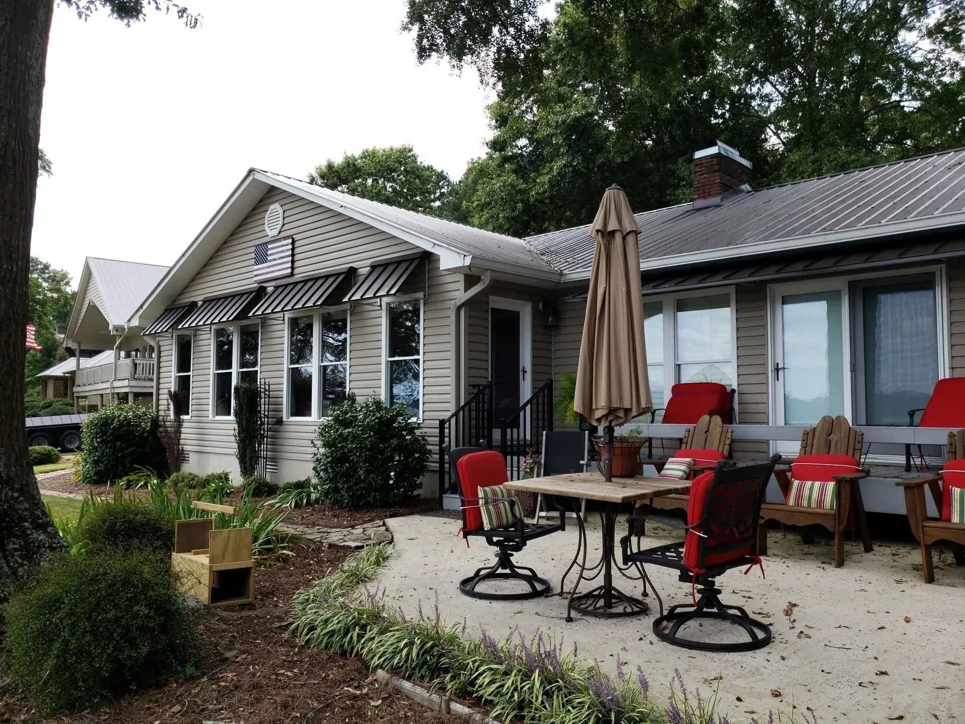 House with Table and Chairs — Decatur, AL — Evans Awnings